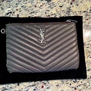 COPY - Yves Saint Lauren zip up pouch bag used with silver logo. Dust bag only …